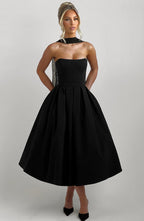 Edith | Vestido midi negro con falda plisada y escote palabra de honor