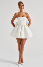 Salome | Vestido mini de jacquard marfil sin tirantes con lazo