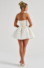 Salome | Vestido mini de jacquard marfil sin tirantes con lazo